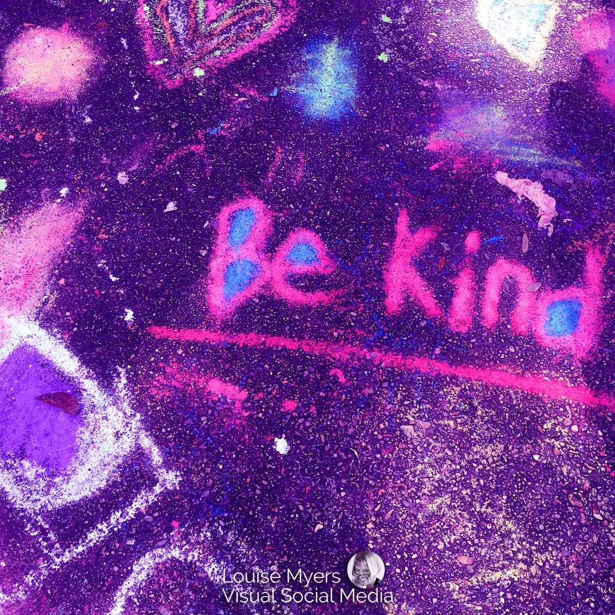 photo of graffiti saying be kind for Random Acts of Kindness Day.