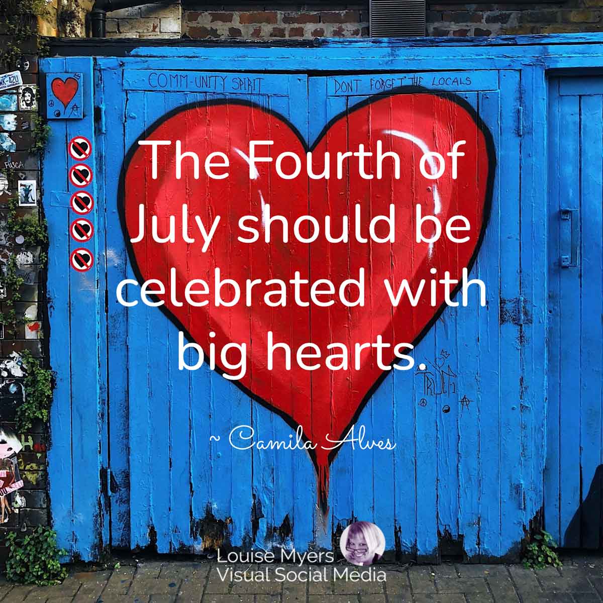 huge red heart painted on blue wall says, The Fourth of July should be celebrated with big hearts.