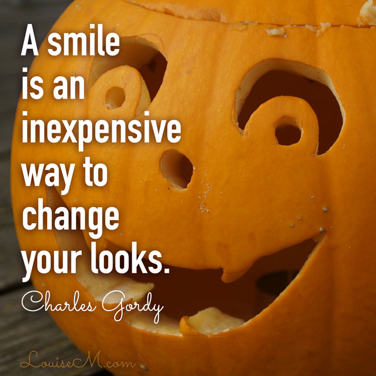 grinning pumpkin says a smile can change your looks.