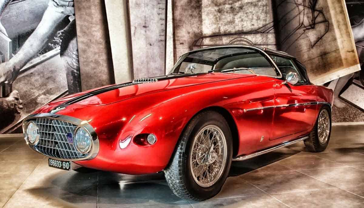 vintage red fiat sportscar.